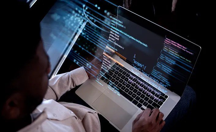 Code on a developer's screen. Claude Sonnet 4.5 is built for long-running coding agents.