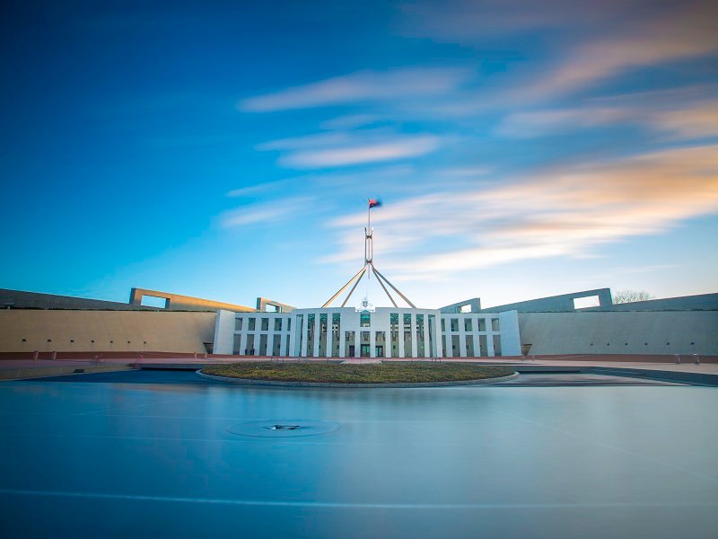 Parliament House in Canberra, where OpenAI executives face a parliamentary AI committee this week.