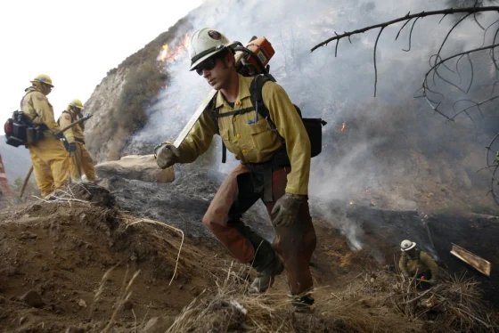 Firefighters battle the 1,048-acre Bouquet Fire in Angeles National Forest as October heat strains the Southern California grid.