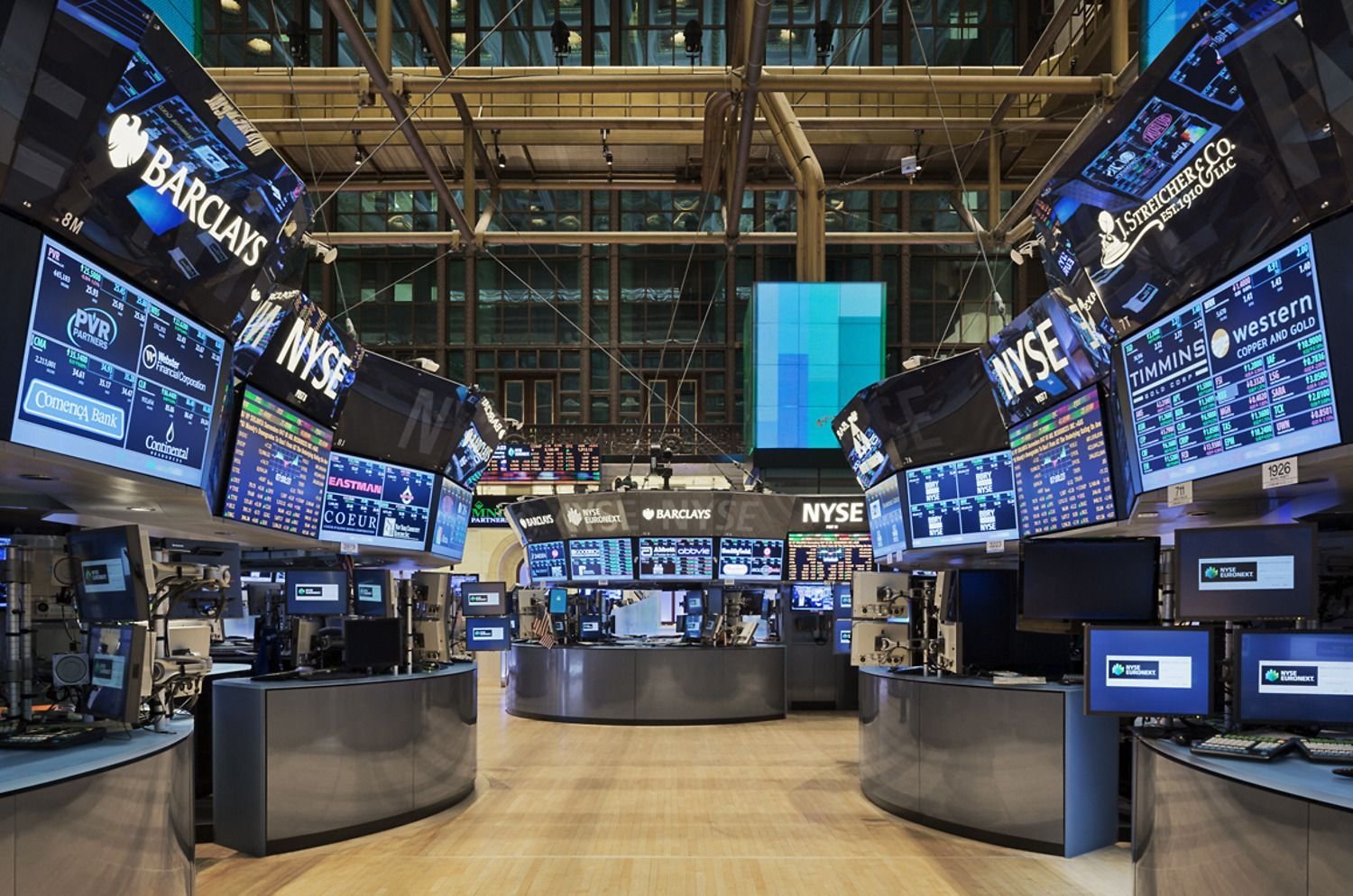 Trading screens on Wall Street. Disclosed insider trades lead the watch list.