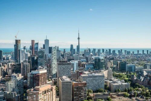 Homes in Toronto, where prices are down 3.7 per cent year over year in new market reports. (File photo)