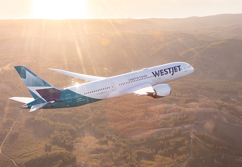 A WestJet aircraft in file imagery; the airline's latest seat sale covers select domestic routes.