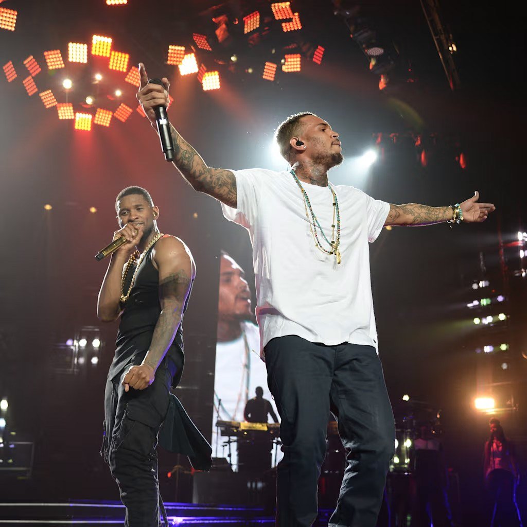 Usher and Chris Brown. Four October dates on their R&B Tour have been cancelled.