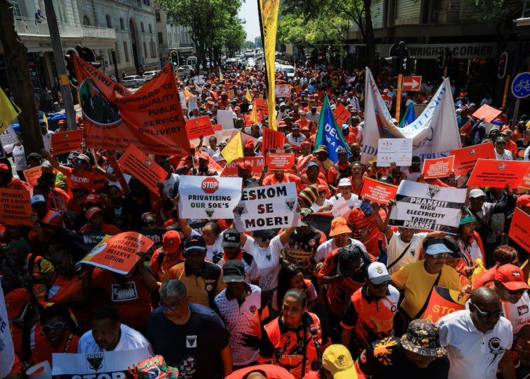 COSATU protesters march in Cape Town during nationwide protest action on October 7.