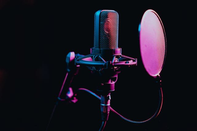 A microphone in a podcast studio.