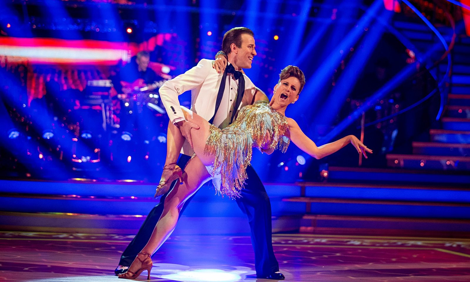 Ballroom dancers under the lights. Anton Du Beke's Christmas single arrives November 6.