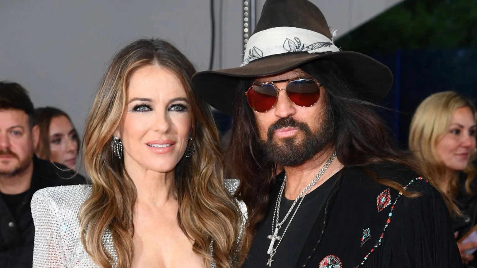 Billy Ray Cyrus and Elizabeth Hurley, who are reported to be engaged after more than a year of dating.