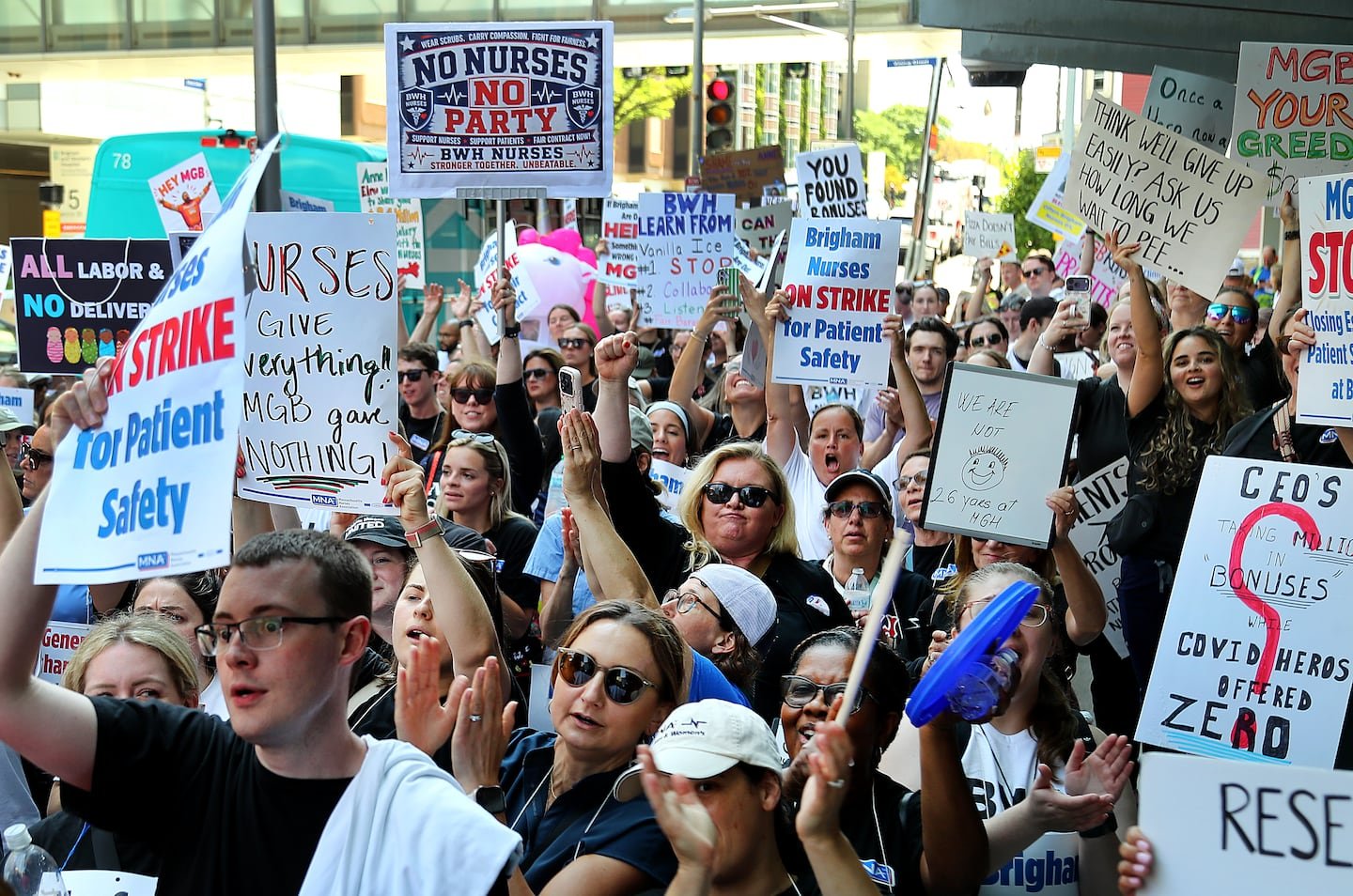 Nurses outside a Boston hospital. Brigham and Women's nurses will vote on a final contract offer instead of striking Wednesday.
