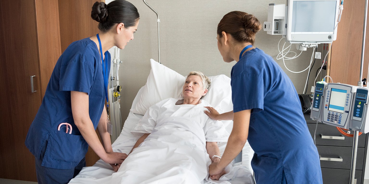 Nurses at work in a hospital ward.