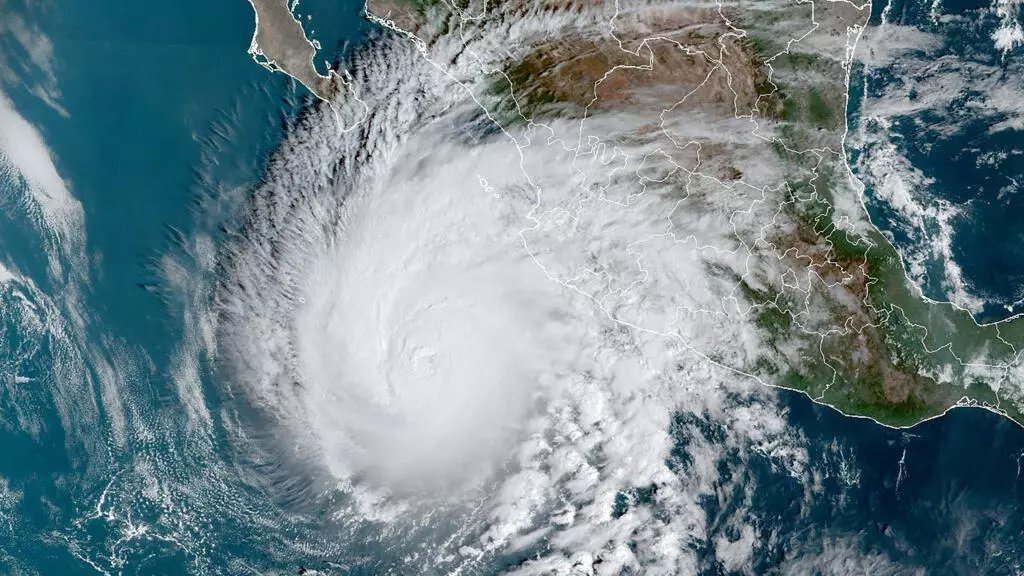 Satellite imagery shows Hurricane Simon, a Category 4 storm, churning toward Mexico's Pacific coast on Oct. 11.