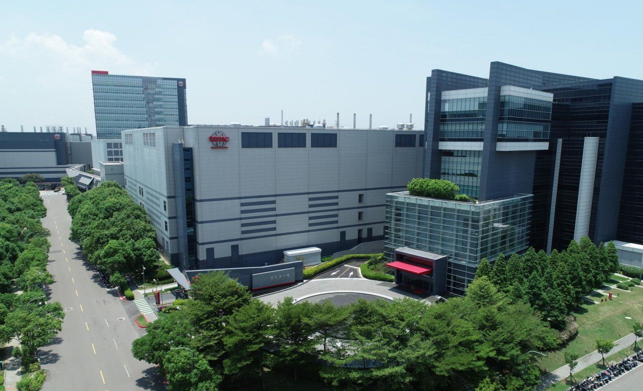 TSMC's chip fabrication plant; executives disclosed buying more than 1,400 shares on October 7.