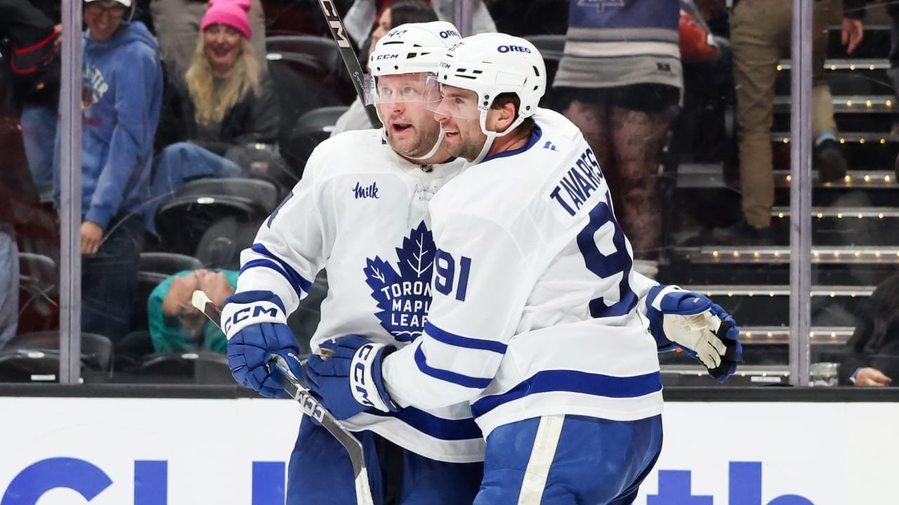 The Maple Leafs celebrate after completing a 5-4 overtime comeback win over the Predators at Scotiabank Arena.