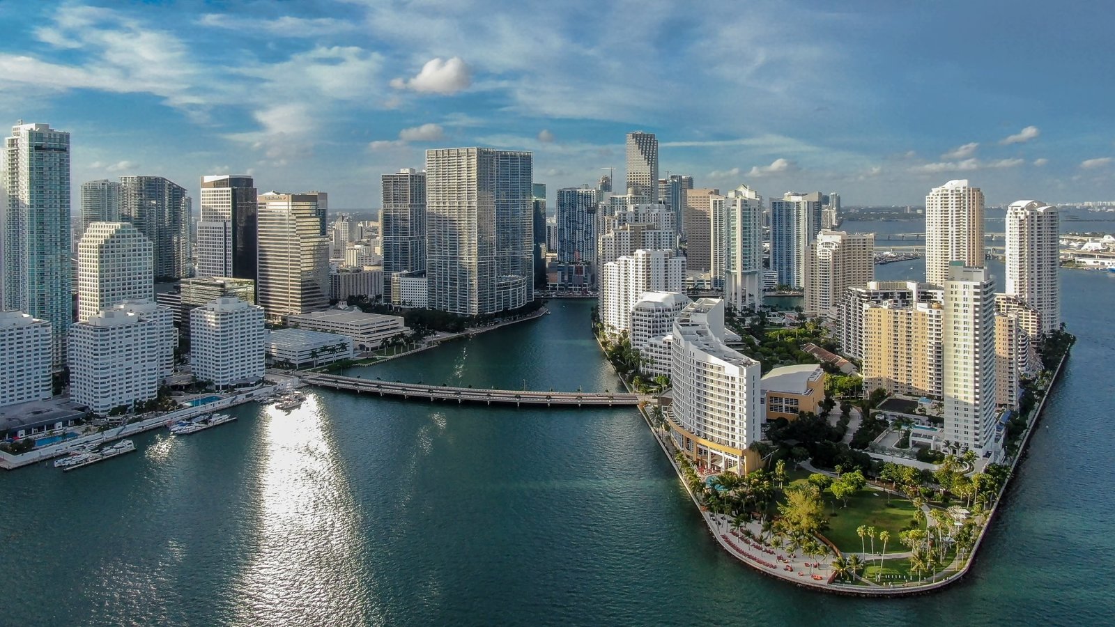 Downtown Miami skyline; the Miami Herald fact-checked Florida candidates Byron Donalds and David Jolly on vaccines.