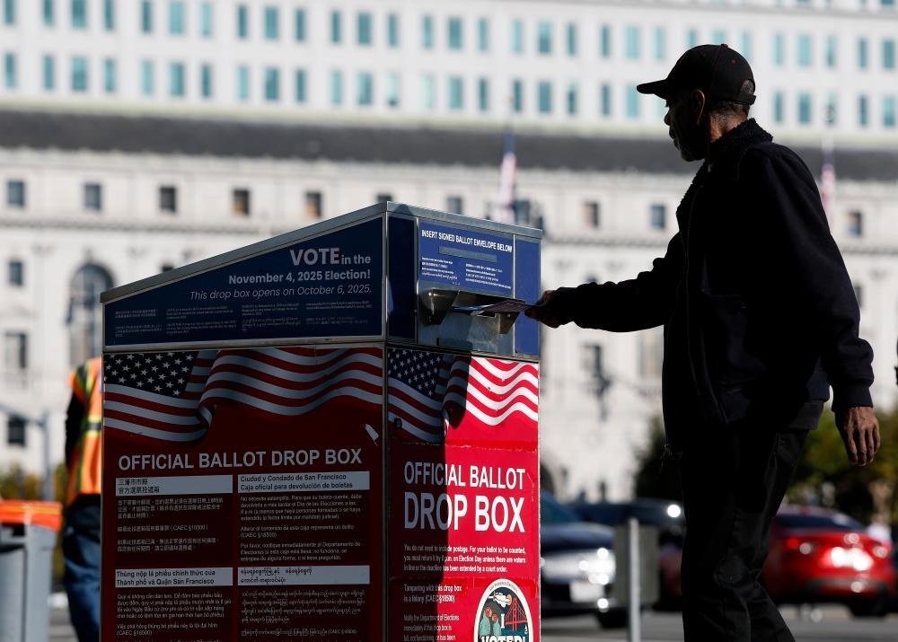 Voting in California, the subject of a new Justice Department lawsuit over mail ballots.