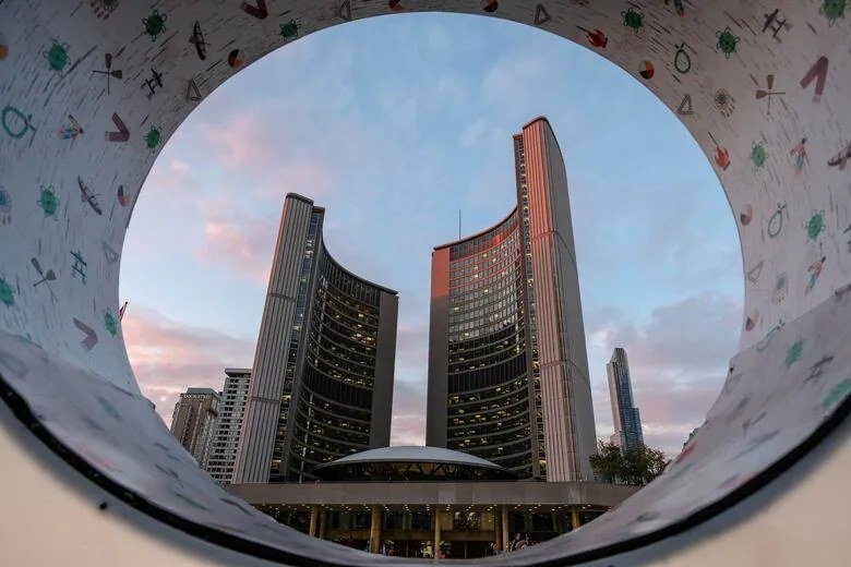 Toronto City Hall; a new Liaison Strategies poll puts the mayoral race between Olivia Chow and Brad Bradford inside the margin of error.