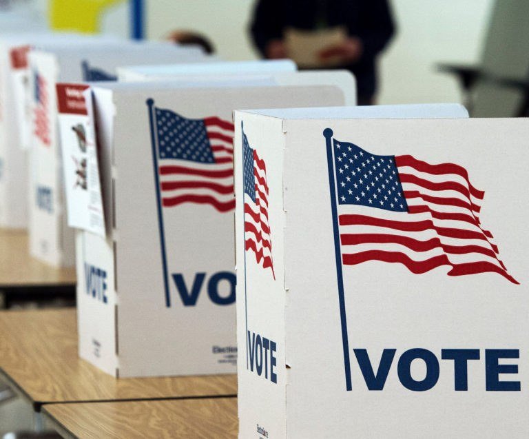 Voters at the ballot box in the United States. Early voting is underway for the November 3 midterm elections.