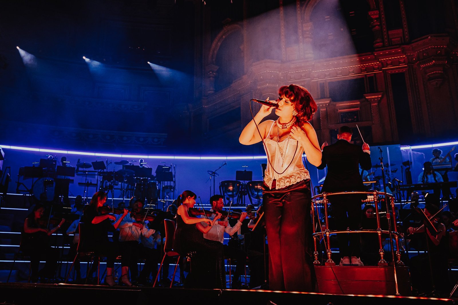 Raye performs live; her symphony concert series is expanding to six more countries.