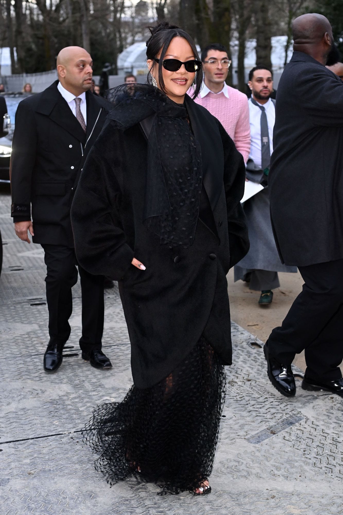 Rihanna sat front row at Jonathan Anderson's Dior show during Paris Fashion Week, days before her one-word response to EJ Johnson went viral.