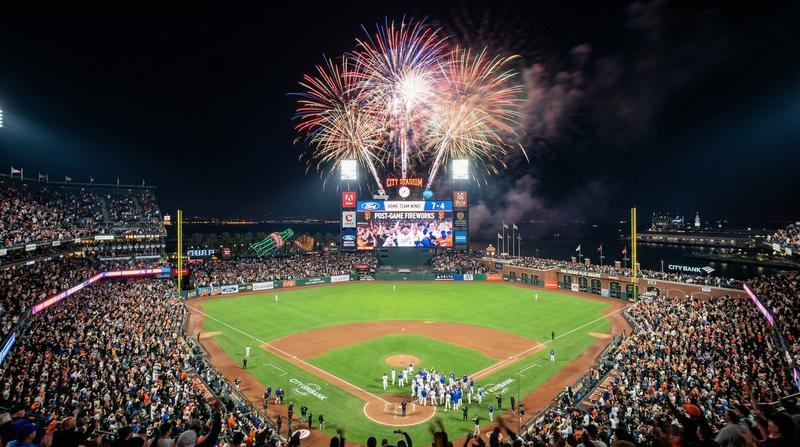 A packed baseball stadium under the lights — the Rays and White Sox are one win from the ALCS.