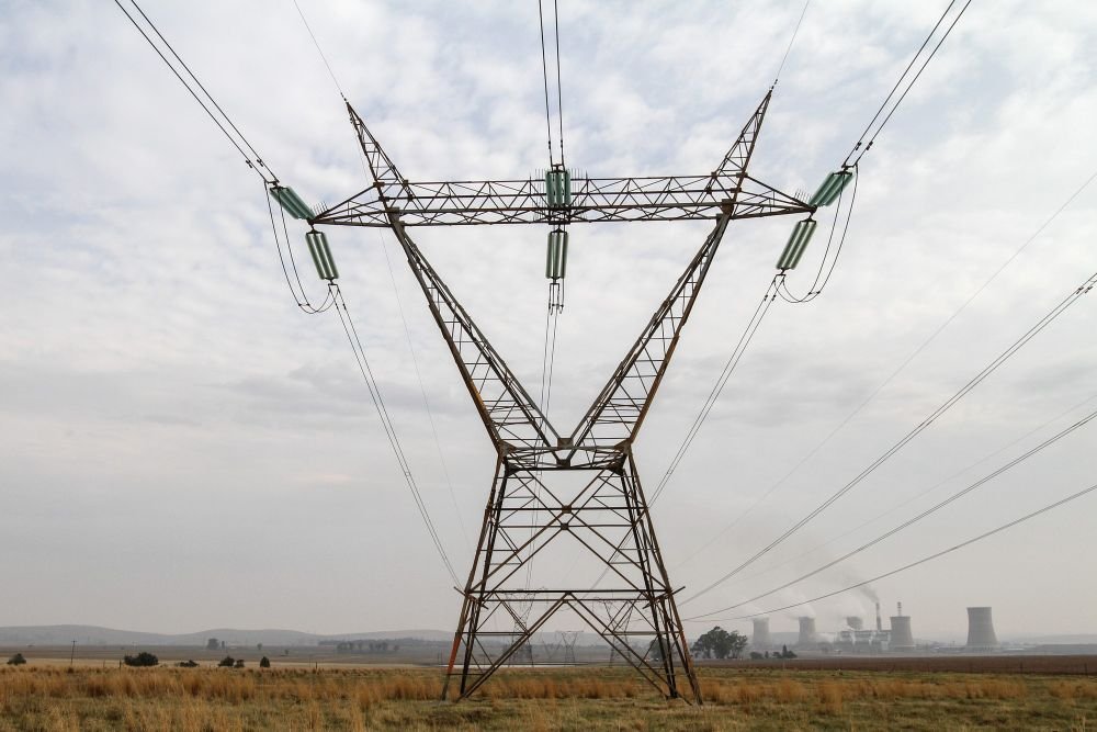 Transmission lines in South Africa. Phase I of the grid programme has been delayed to 2027.