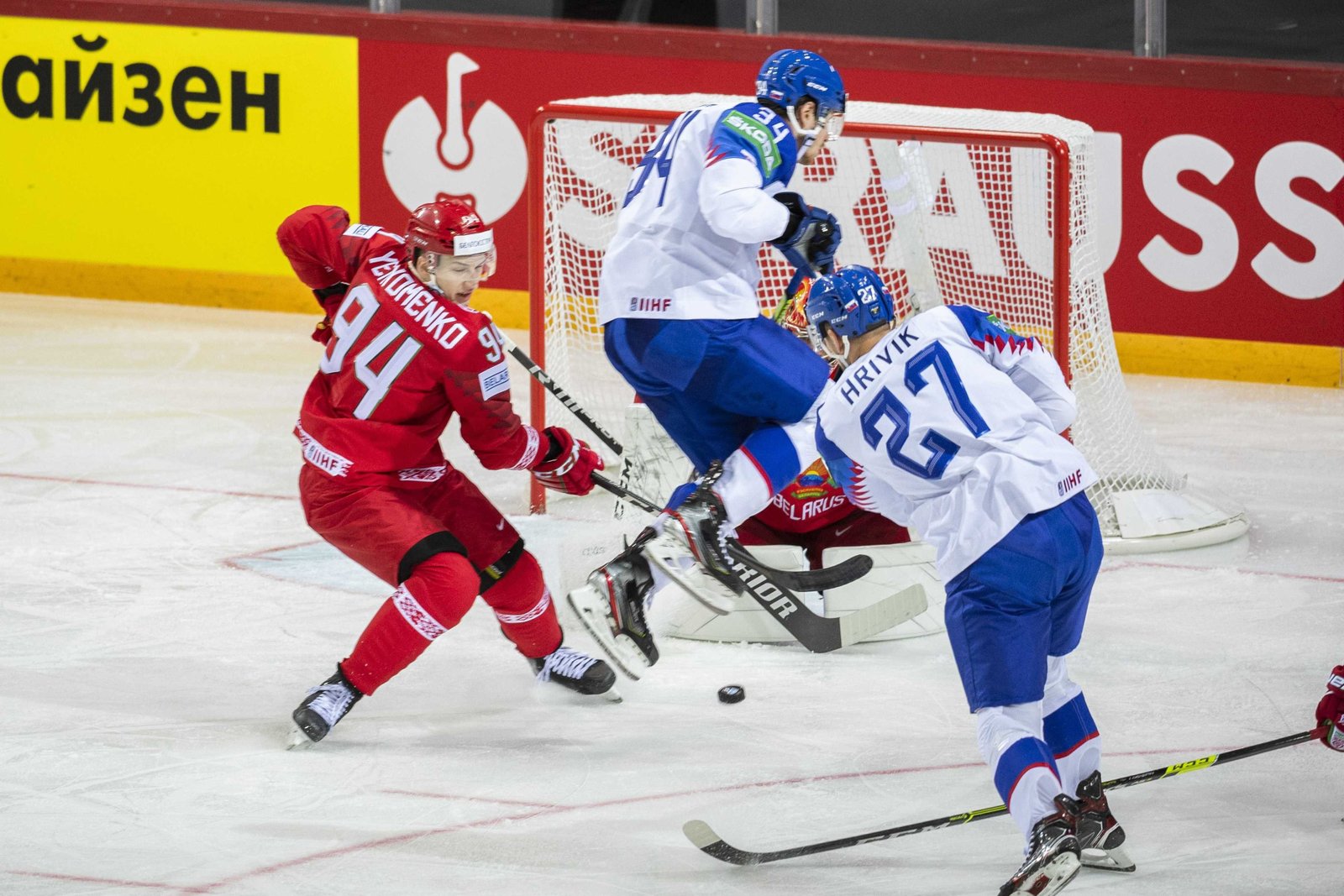 Ice hockey players on the ice during an NHL game.
