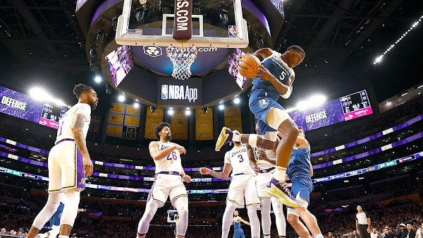 NBA action under arena lights. Eleven games were played across the league on Wednesday night.