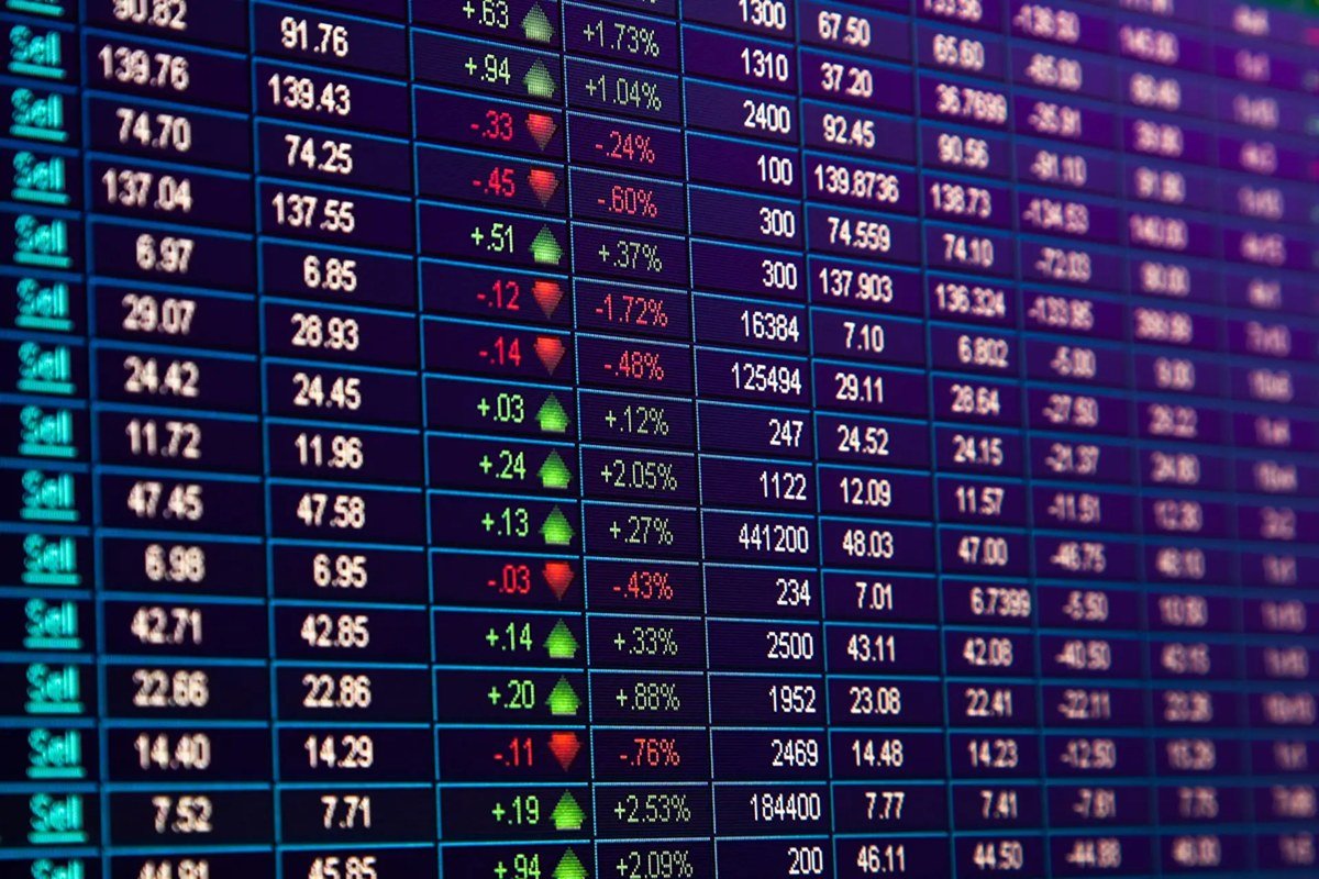 Stock boards at an exchange. Insider buying disclosures and income rankings lead the October 13 watchlists.