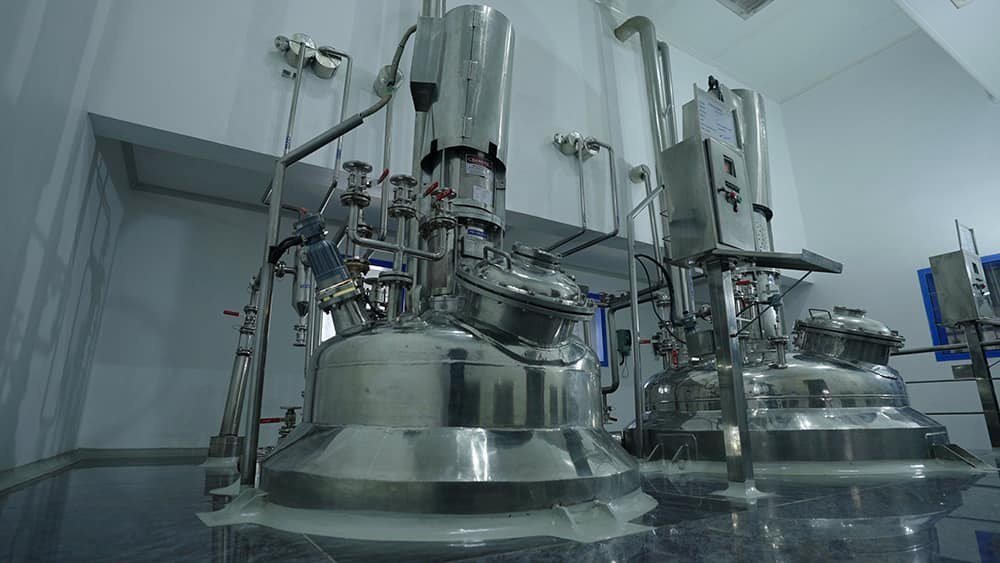 A chemical production facility; Scimplify uses AI and partner plants to make specialty chemicals and critical materials.