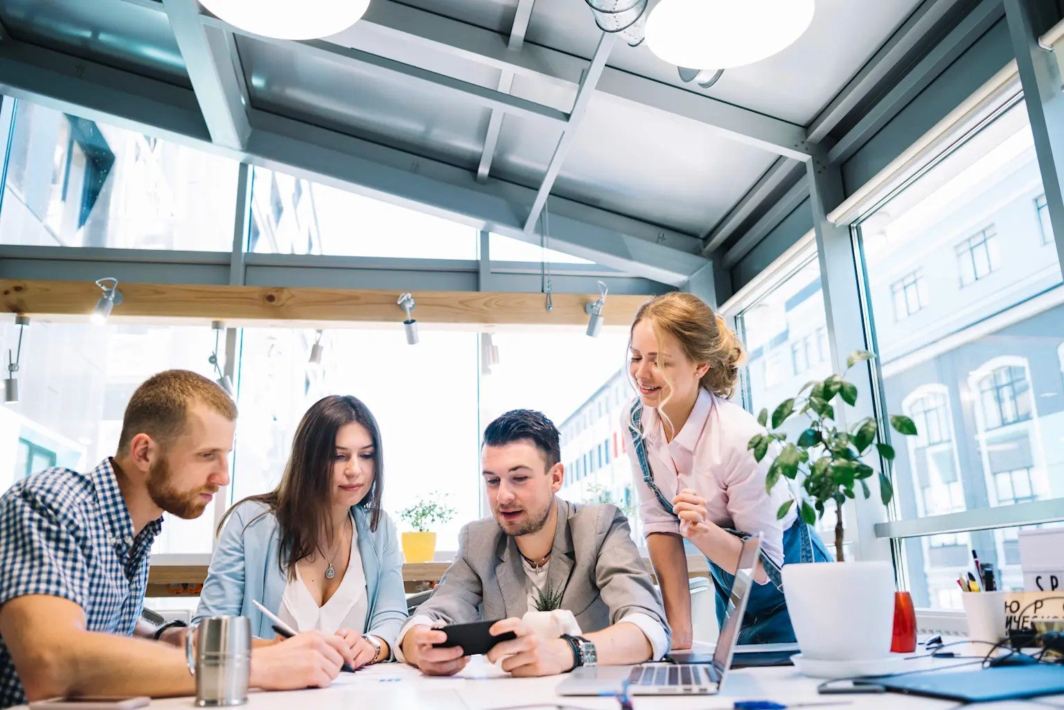 Workplace messaging on a phone, the frontline battleground Zenzap's AI agents are built for.