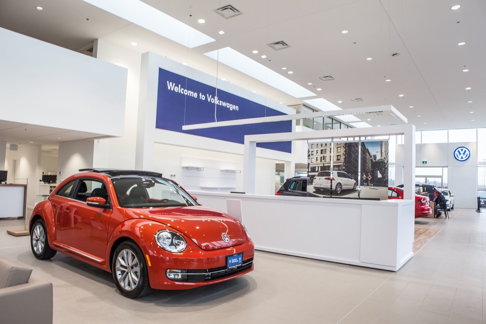 A Volkswagen dealership showroom; the downtown Toronto store closes October 31.