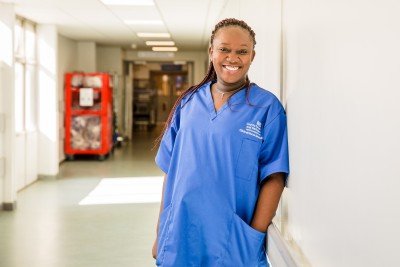 A nurse in a hospital corridor. The UK government is consulting on legally protecting the “nurse” job title. (File photo)