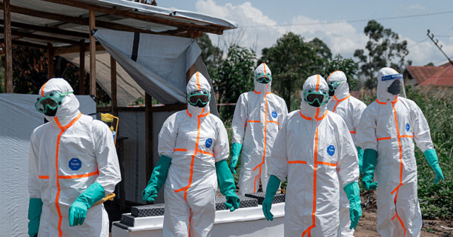 Health workers in protective equipment during an Ebola response in Congo. Five cases are now confirmed in Mbandaka.